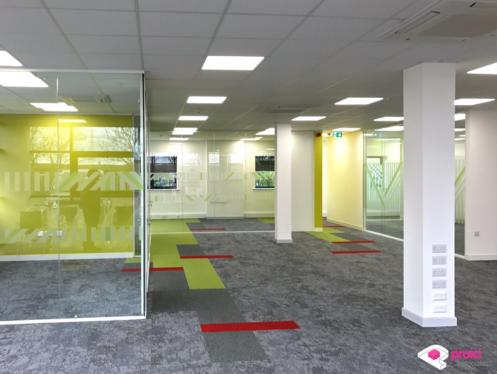 Proici Extended showroom with carpets frameless glass partitions and glass doors - Newark