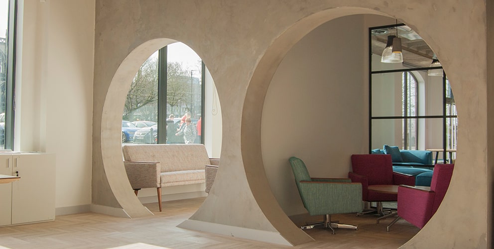 Concrete Office Meeting Space with Natural Lighting Levels