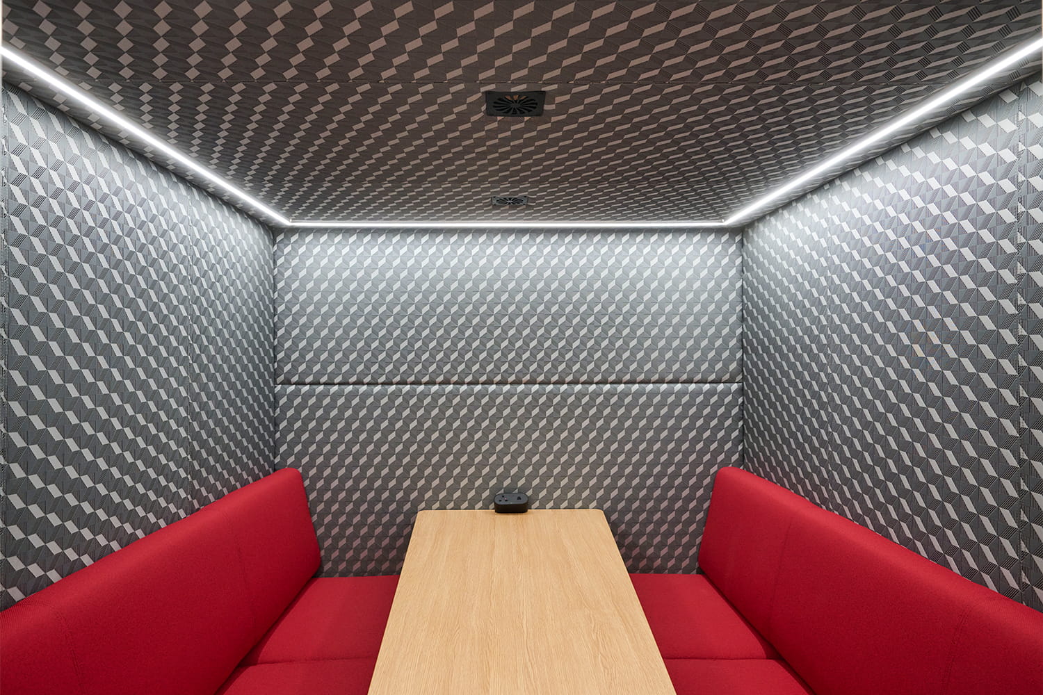 Interior of an acoustic meeting booth within DiversiTech International’s Nottingham office fit out