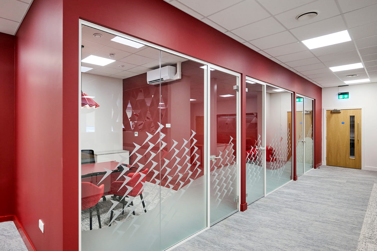 Glass fronted meeting rooms and office spaces at DiversiTech International in Nottingham