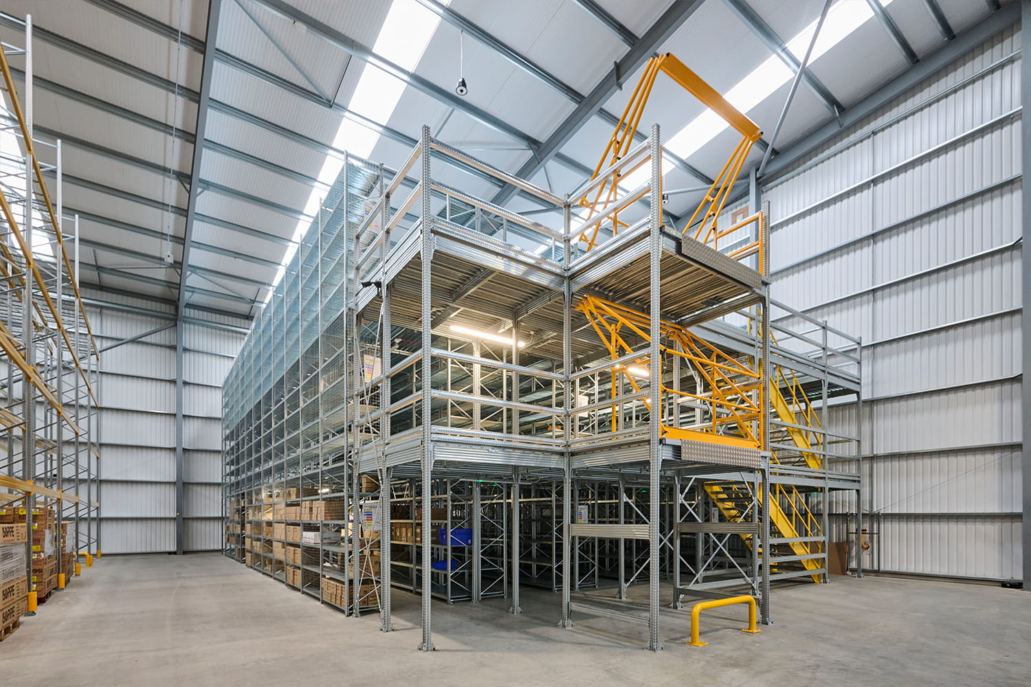 Three-tier industrial shelving with pallet gate at DiversiTech International’s Nottingham warehouse