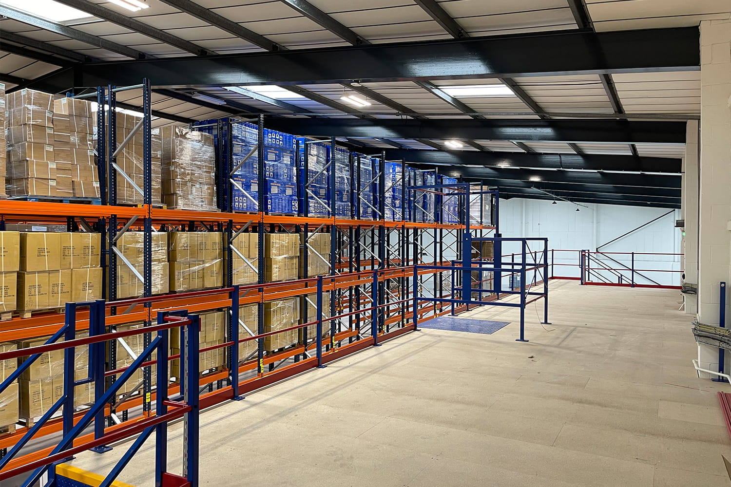 mezzanine floor overlooking warehouse racking installation in Leeds